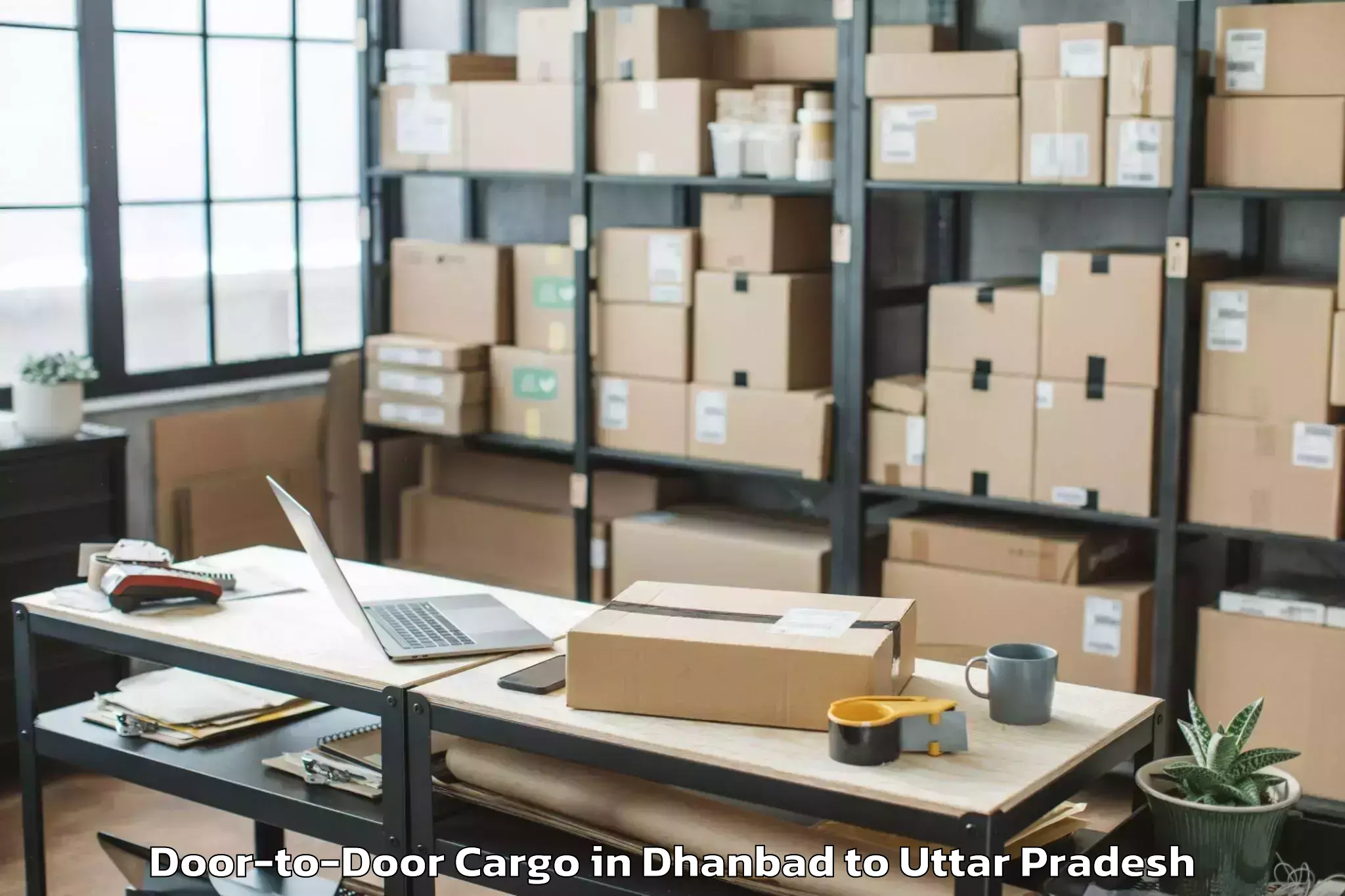 Book Dhanbad to Safipur Door To Door Cargo Online